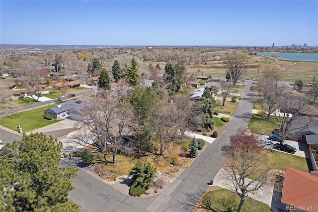 bird's eye view with a water view and a residential view