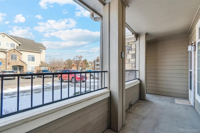 balcony featuring a residential view