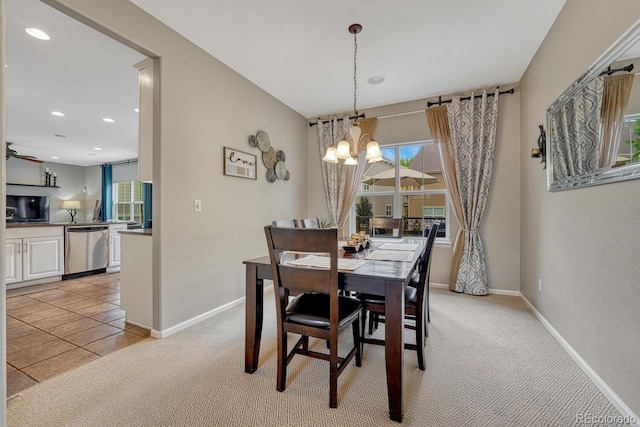 5625 S Buchanan St, Aurora, CO 80016 - dining area featuring light carpet, baseboards, a chandelier, and recessed lighting