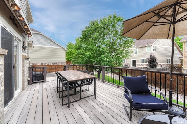 5625 S Buchanan St, Aurora, CO 80016 - wooden deck with outdoor dining space