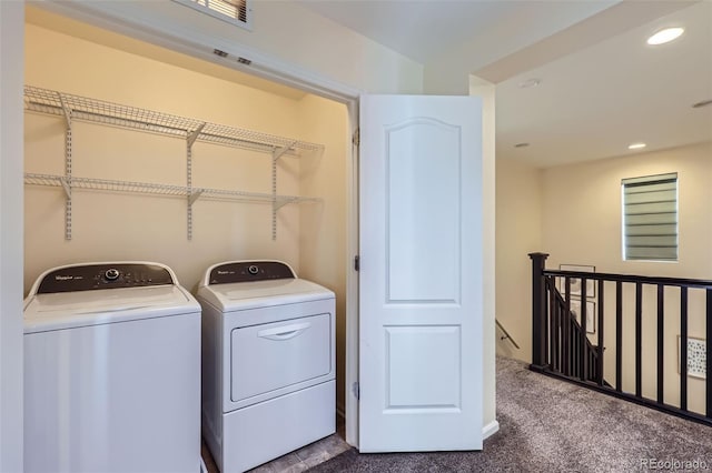 laundry room with carpet, washing machine and clothes dryer, recessed lighting, visible vents, and laundry area