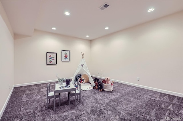 rec room featuring dark colored carpet, recessed lighting, visible vents, and baseboards