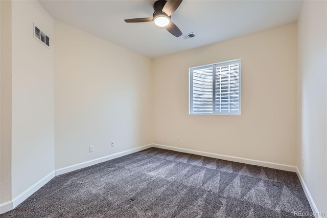 unfurnished room with baseboards, visible vents, and carpet flooring