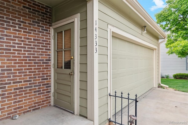 14333 E Warren Pl, Aurora, CO 80014 - garage featuring concrete driveway