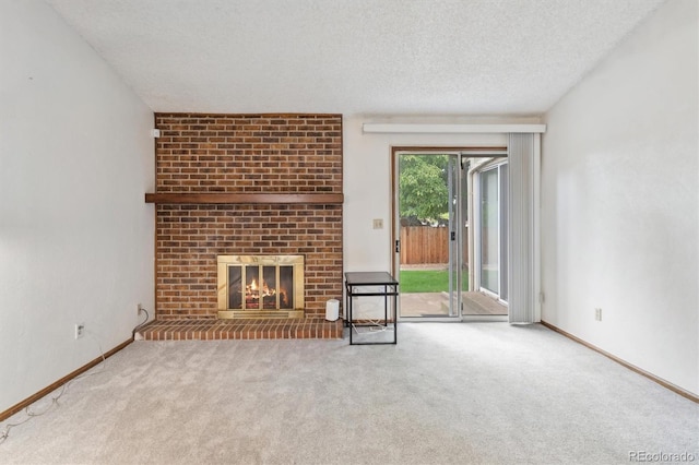14333 E Warren Pl, Aurora, CO 80014 - unfurnished living room with a fireplace, carpet, a textured ceiling, and baseboards