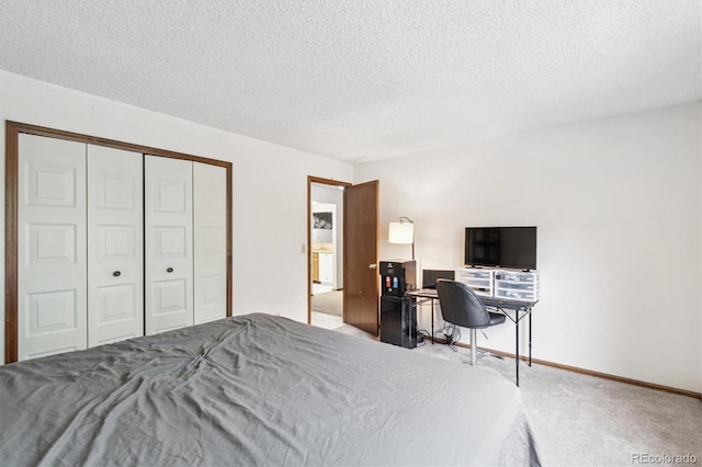 14333 E Warren Pl, Aurora, CO 80014 - bedroom with carpet, a textured ceiling, a closet, baseboards, and a desk