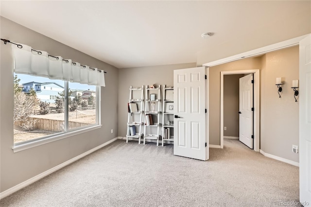 office area with carpet and baseboards