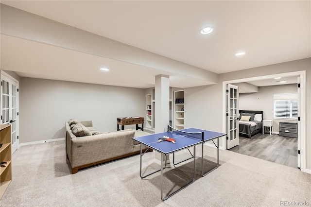 recreation room featuring french doors, recessed lighting, carpet flooring, and baseboards