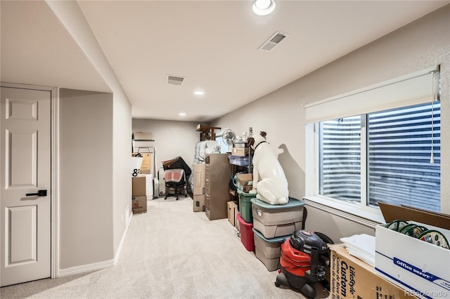 interior space with carpet, visible vents, and recessed lighting