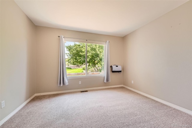 3416 Hawthorne Dr, Highlands Ranch, CO 80126 - spare room with carpet floors, baseboards, and heating unit