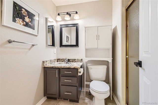 3416 Hawthorne Dr, Highlands Ranch, CO 80126 - bathroom featuring vanity, toilet, a stall shower, and tile patterned flooring
