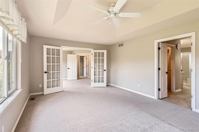 3416 Hawthorne Dr, Highlands Ranch, CO 80126 - spare room with french doors, light carpet, baseboards, and a ceiling fan
