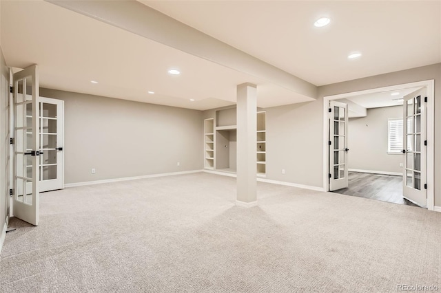 3416 Hawthorne Dr, Highlands Ranch, CO 80126 - below grade area with french doors, carpet floors, baseboards, and recessed lighting