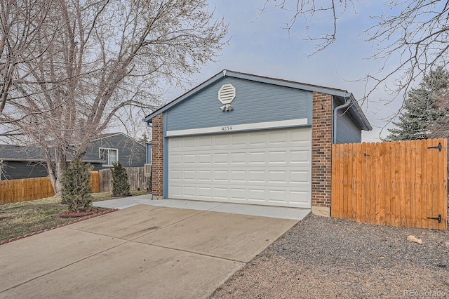 garage with fence