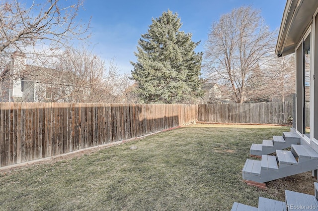 view of yard featuring a fenced backyard