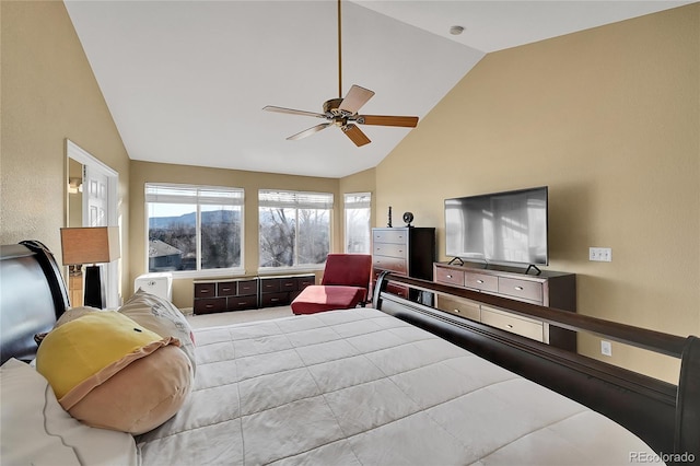 bedroom with ceiling fan and vaulted ceiling