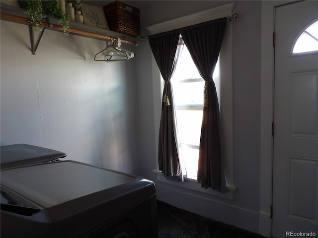 7651 State Highway 194, Las Animas, CO 81054 - interior space with carpet flooring and washer / dryer