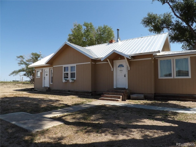 7651 State Highway 194, Las Animas, CO 81054 - view of front of home with entry steps and metal roof