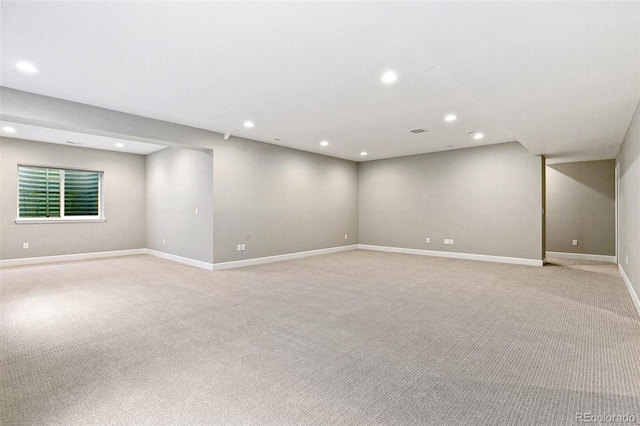 basement with light colored carpet