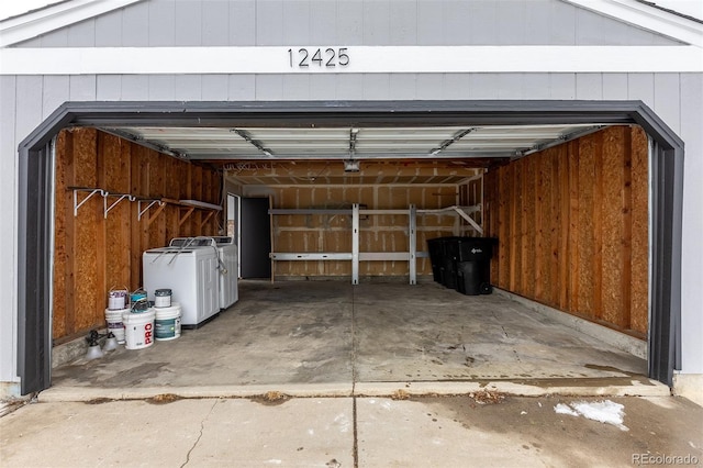 garage with independent washer and dryer