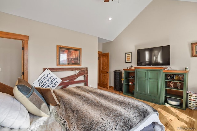 bedroom with light wood-style flooring, high vaulted ceiling, and recessed lighting