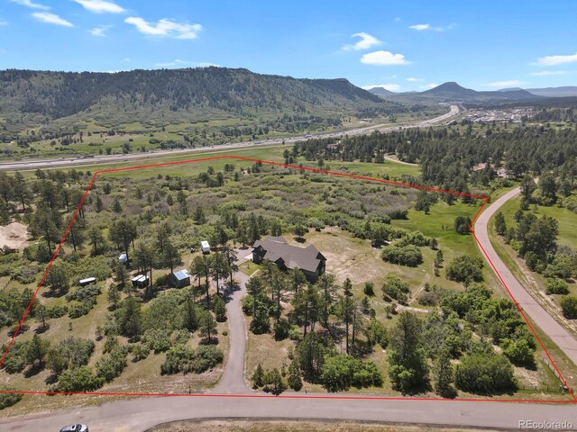 5800 Elk View Ct, Larkspur, CO 80118 - aerial overview of property's location featuring property parcel outlined and mountains