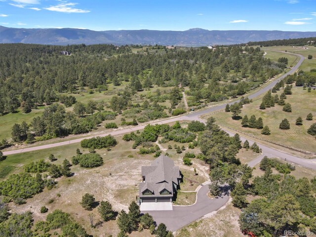 5800 Elk View Ct, Larkspur, CO 80118 - bird's eye view of a forest and mountains