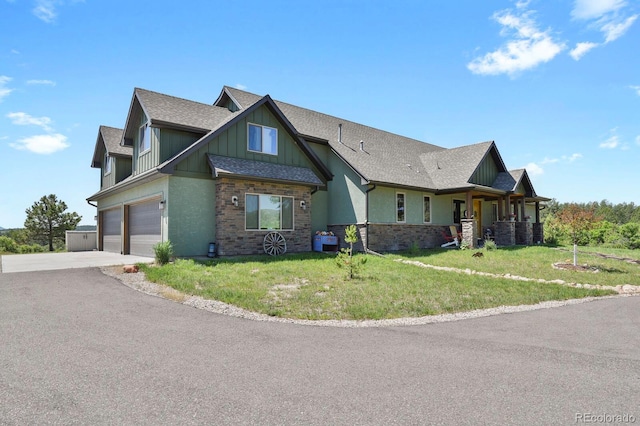 5800 Elk View Ct, Larkspur, CO 80118 - craftsman house featuring a shingled roof, a front yard, driveway, board and batten siding, and stone siding