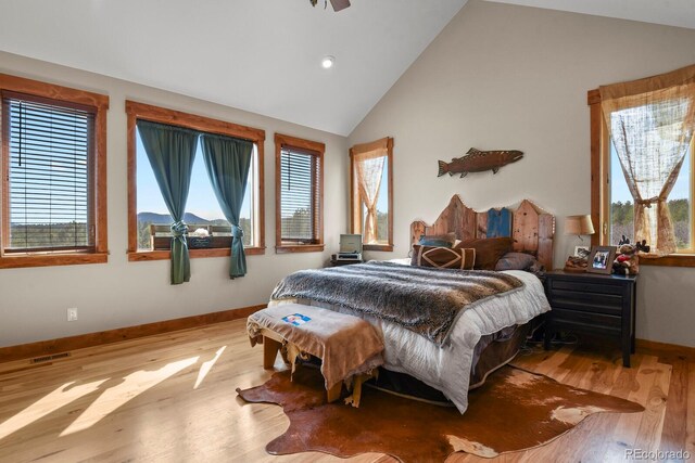 5800 Elk View Ct, Larkspur, CO 80118 - bedroom featuring wood finished floors, baseboards, recessed lighting, and high vaulted ceiling