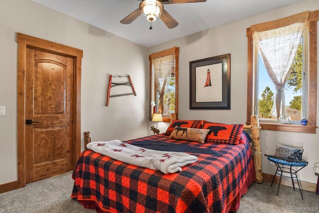 5800 Elk View Ct, Larkspur, CO 80118 - carpeted bedroom featuring baseboards and ceiling fan