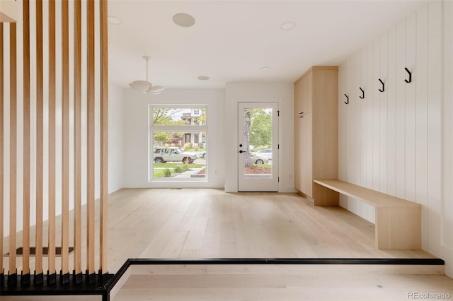 mudroom with wood finished floors