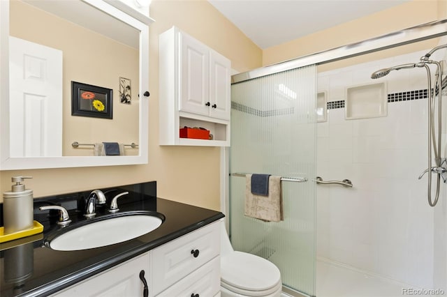 9598 Lowell Blvd, Westminster, CO 80031 - full bathroom featuring a shower stall, vanity, and toilet