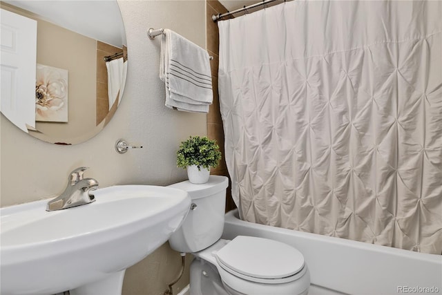 909 N Logan St Unit 1B, Denver, CO 80203 - full bathroom featuring toilet and shower / tub combo