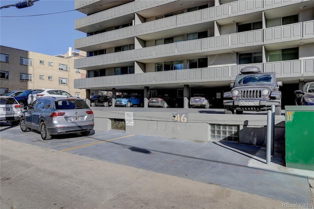 909 N Logan St Unit 1B, Denver, CO 80203 - view of apartment building / complex with uncovered parking