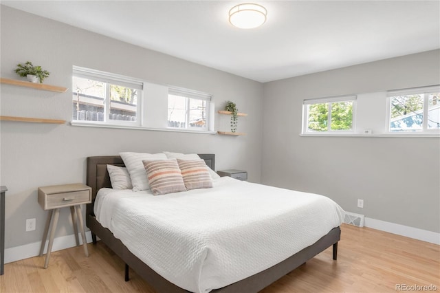 4933 Grove St, Denver, CO 80221 - bedroom featuring light wood finished floors and baseboards