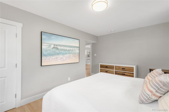 4933 Grove St, Denver, CO 80221 - bedroom featuring light wood-style floors and baseboards