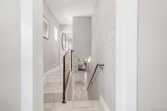 4933 Grove St, Denver, CO 80221 - stairs featuring tile patterned flooring and baseboards