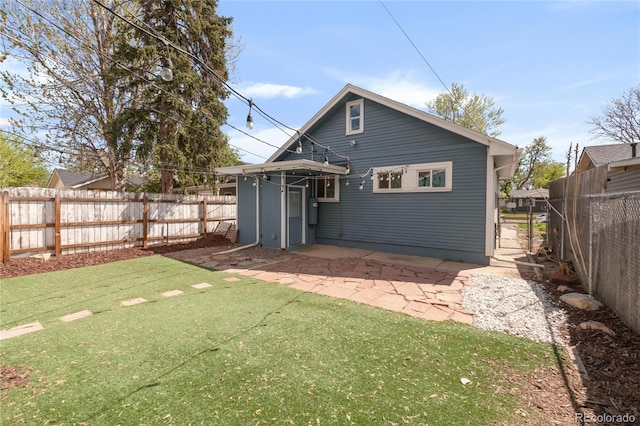 4933 Grove St, Denver, CO 80221 - back of house with a patio area