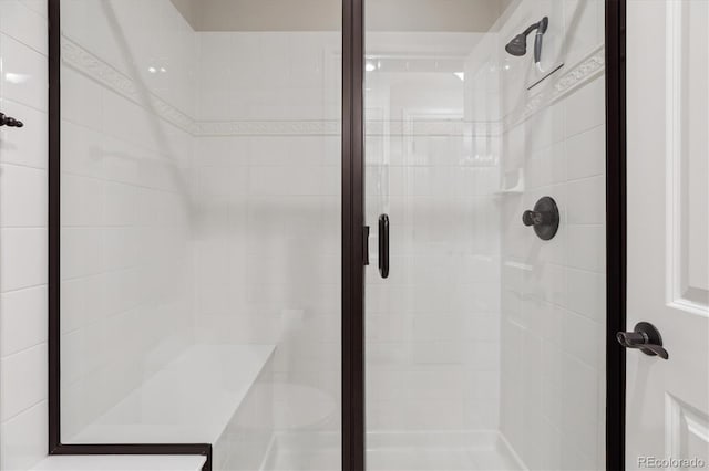 full bathroom with a stall shower