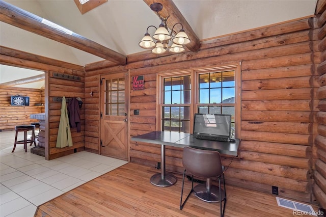 660 Wagon Wheel Rd, Guffey, CO 80820 - office area with rustic walls, hardwood / wood-style flooring, a chandelier, a skylight, and high vaulted ceiling