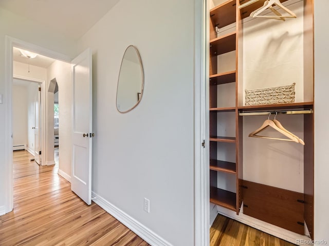 5703 Ammons St, Arvada, CO 80002 - closet featuring a baseboard radiator