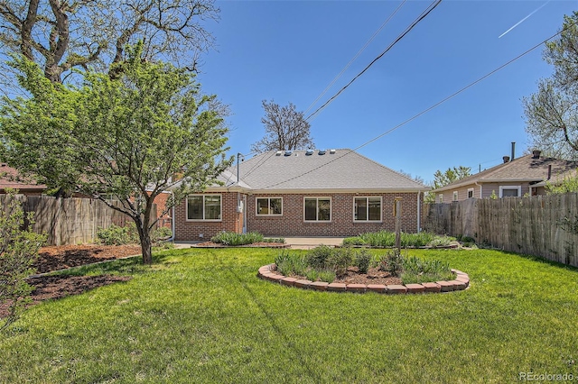 5703 Ammons St, Arvada, CO 80002 - back of house featuring brick siding
