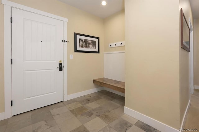 mudroom featuring baseboards and recessed lighting