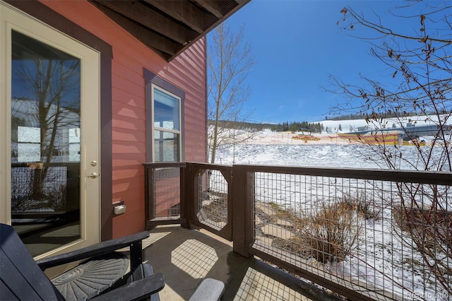 view of snow covered deck