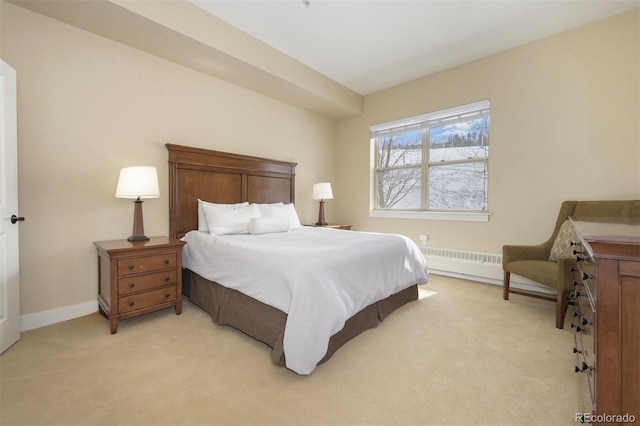 bedroom with baseboards, a baseboard radiator, and light colored carpet