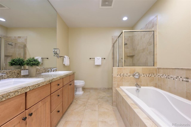 bathroom featuring visible vents, a sink, a shower stall, and a garden tub