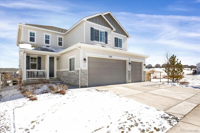 craftsman-style home featuring a garage and covered porch