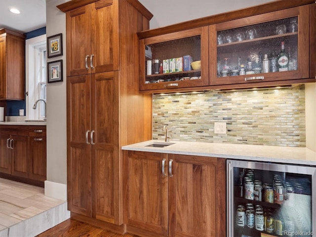 724 N Franklin St, Denver, CO 80218 - indoor wet bar featuring wine cooler, backsplash, light wood-style flooring, and recessed lighting