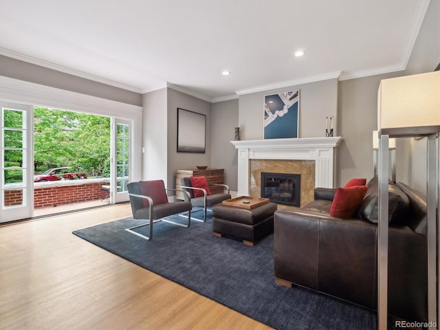 724 N Franklin St, Denver, CO 80218 - living area with wood finished floors, a high end fireplace, crown molding, and recessed lighting