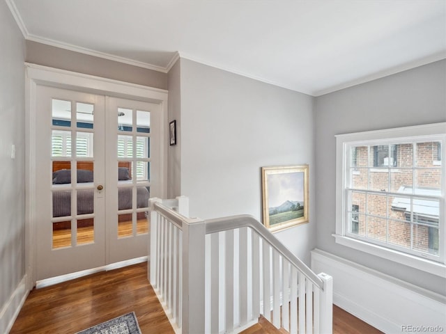 724 N Franklin St, Denver, CO 80218 - hall featuring an upstairs landing, french doors, wood finished floors, crown molding, and baseboards